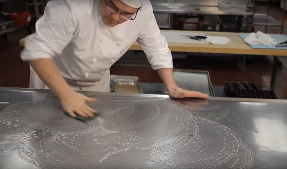 video preview image of cook cleaning a counter